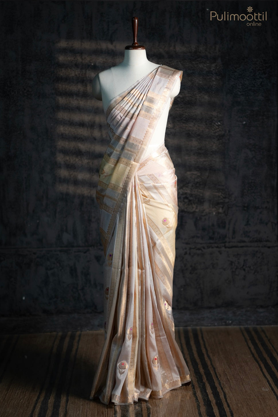 Bone cream colour organza saree.