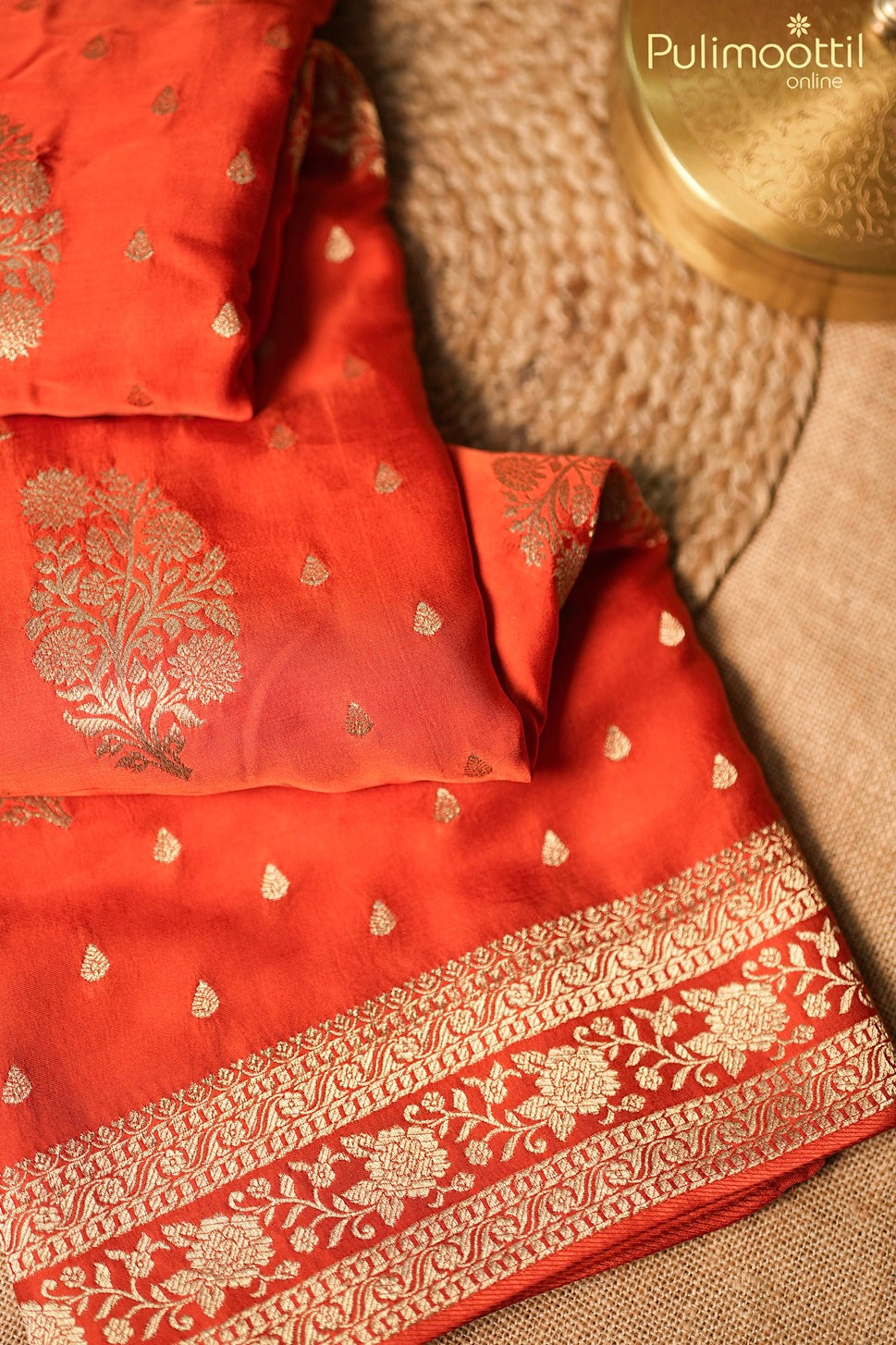 Reddish orange color Banarasi saree