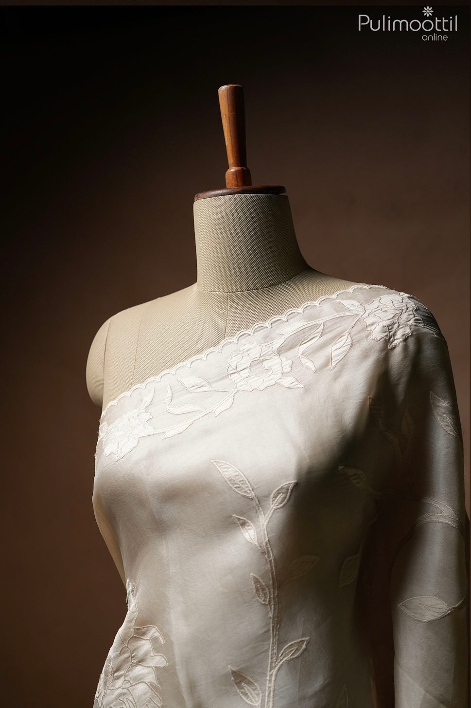 Ivory color organza saree