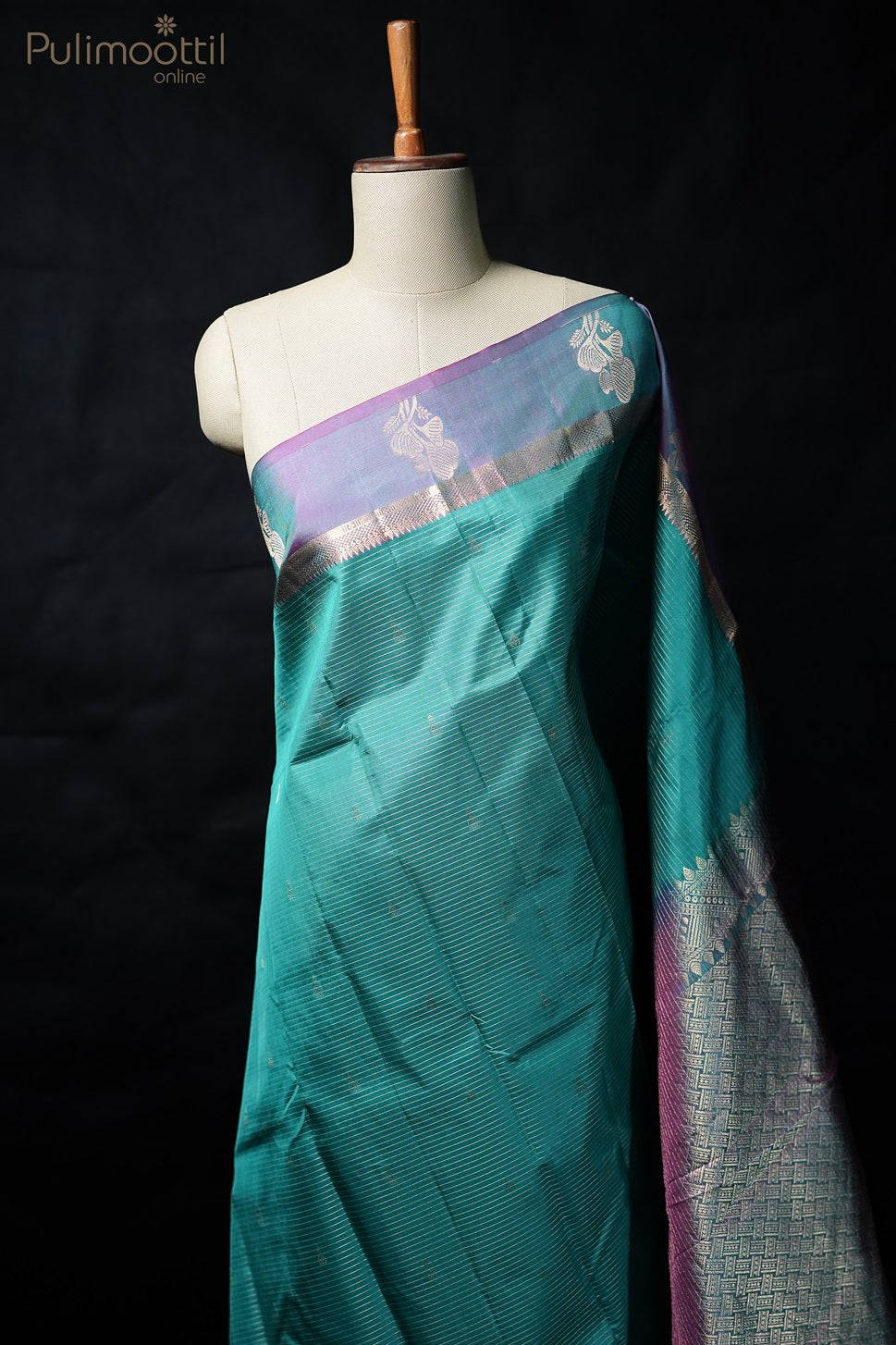 Peacock green-colored Kanchipuram soft silk saree
