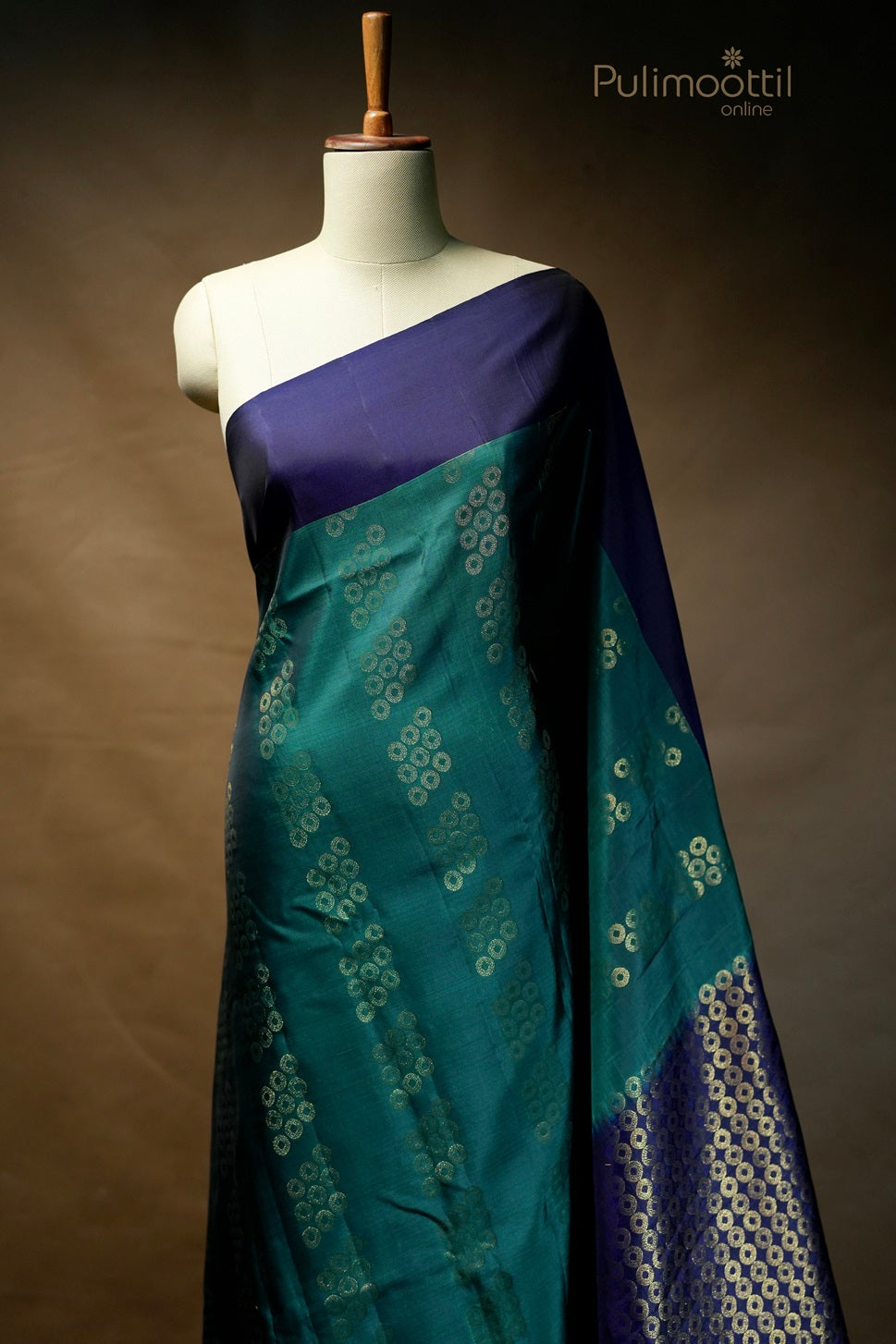 Dark blue-green colored Kanchipuram saree