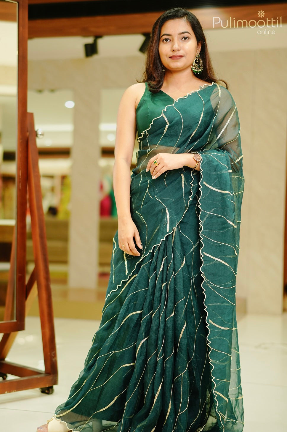 Bottle green color organza saree