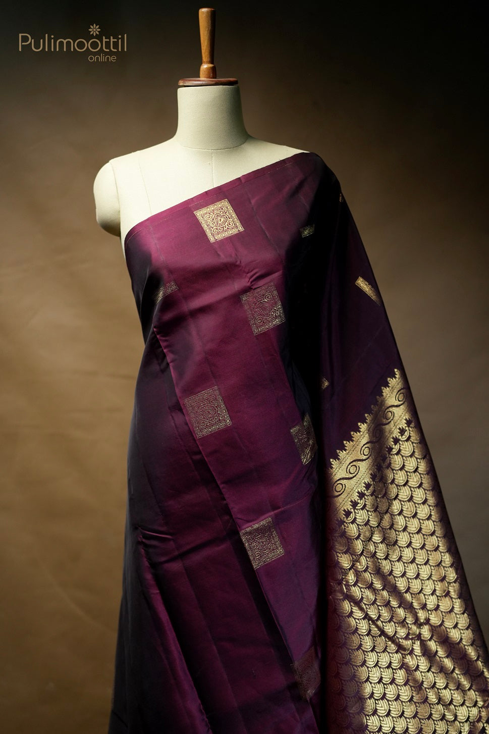 Dark maroon-colored Kanchipuram saree
