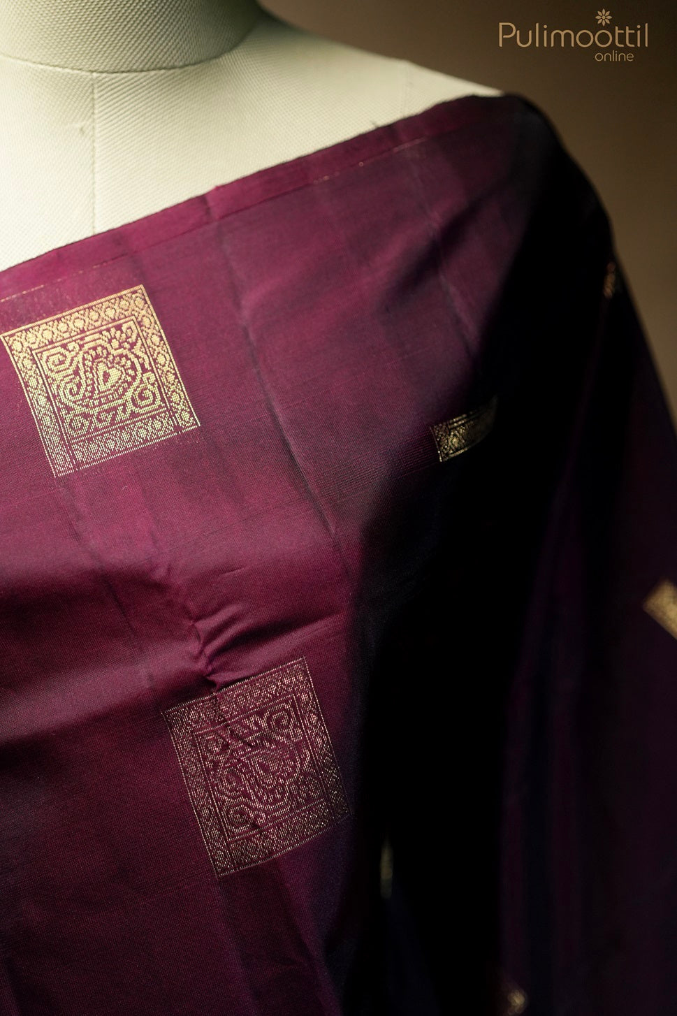Dark maroon-colored Kanchipuram saree