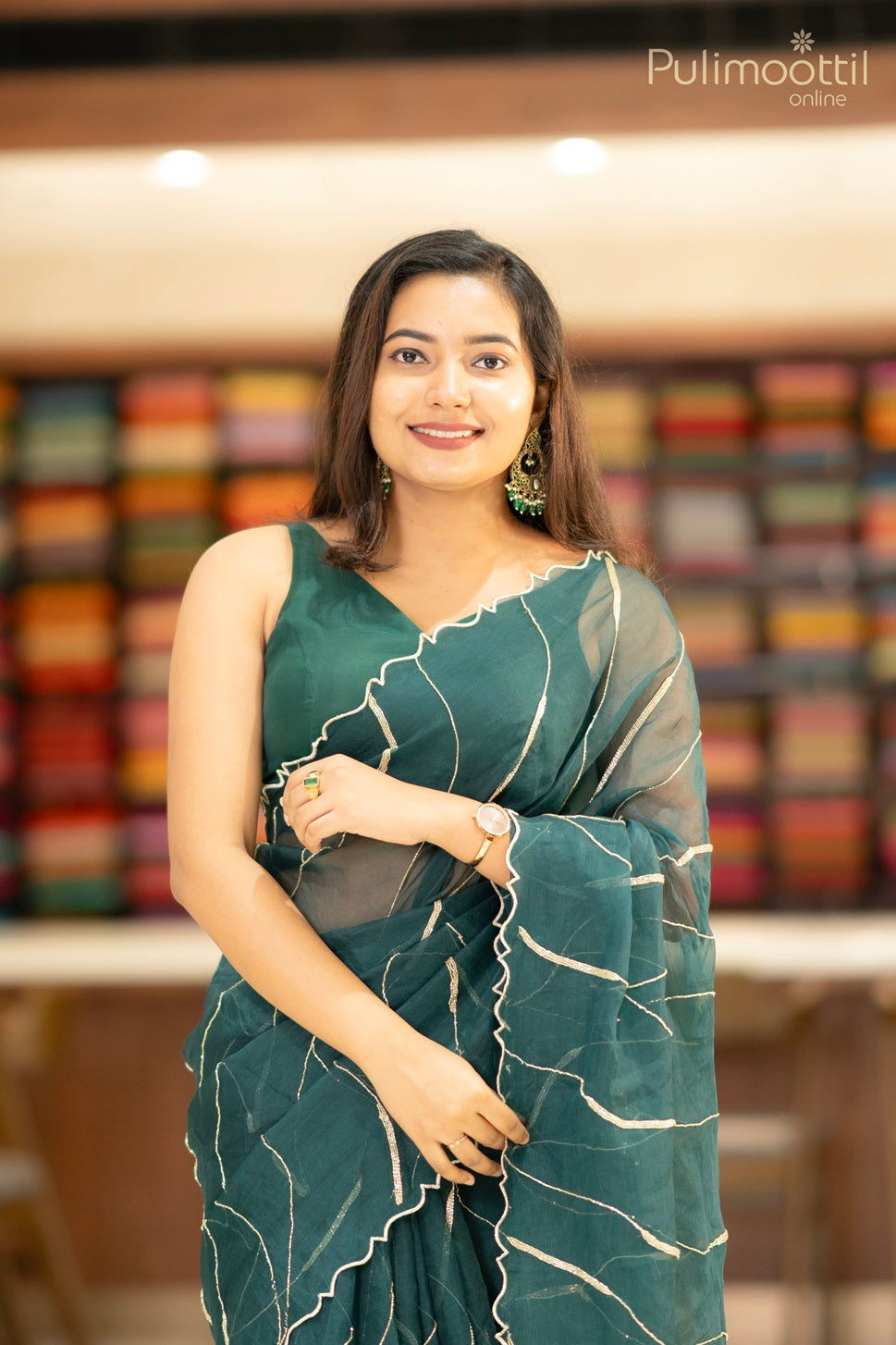 Bottle green color organza saree