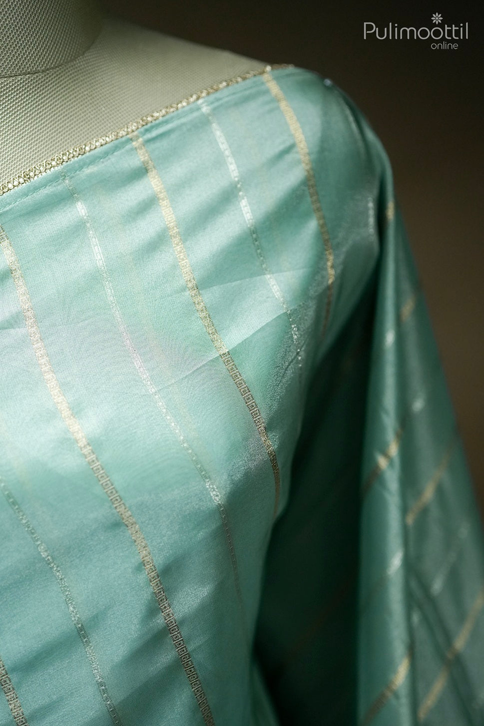 Pastel mint green color organza fancy saree