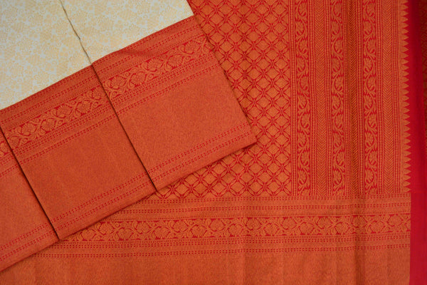 Off white colour Kanchipuram brocade saree.